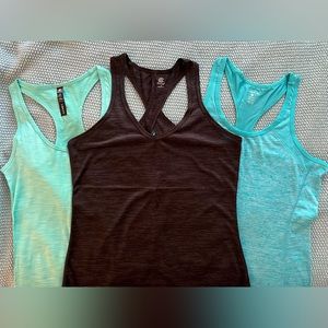 3 Lightweight, quick dry, yoga/running/workout tanks/tops - Like New